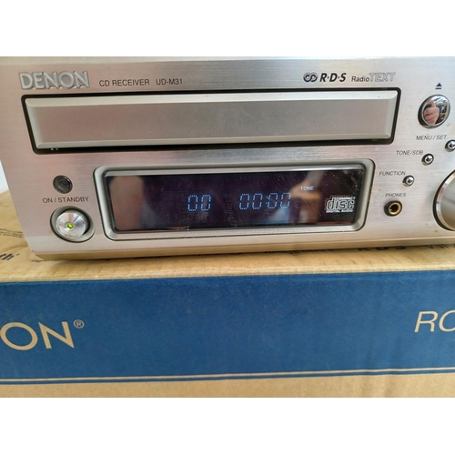 331 - A boxed Denon UD-M31 CD receiver with remote control.