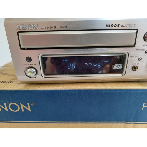 331 - A boxed Denon UD-M31 CD receiver with remote control.