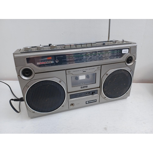 333 - Three portable stereo systems, one Hitachi TRK-8005E cassette/four band radio, one Sony CFD-S70 CD/r... 