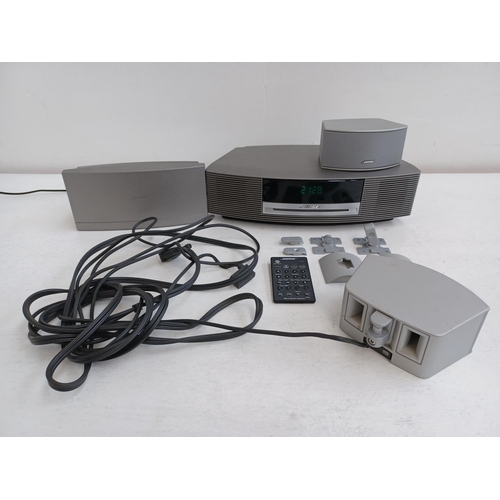 334 - Three items of Bose audio equipment, one Wave music system with remote control, one Wave DAB module ... 