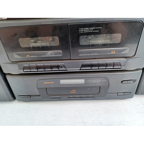 348 - Two items, one Goodmans 2850 midi stereo system comprising CD player, twin cassette, graphic equaliz... 