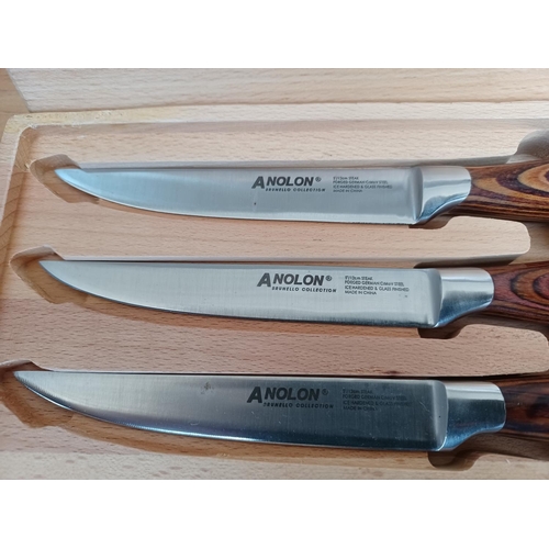 437 - Two items, one Anolon Brunello Collection six piece steak knife set with covered beech wood presenta... 