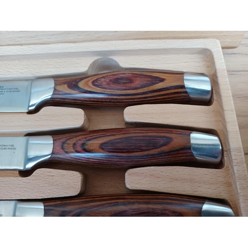 437 - Two items, one Anolon Brunello Collection six piece steak knife set with covered beech wood presenta... 