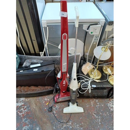 443A - A mixed electrical lot to include vacuum cleaners, Russell Hobbs microwave oven, table lamps, Clairo... 