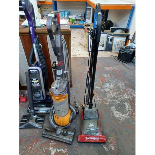 453 - Two upright bagless vacuum cleaners, one Dyson DC25 and one Dirt Devil room mate