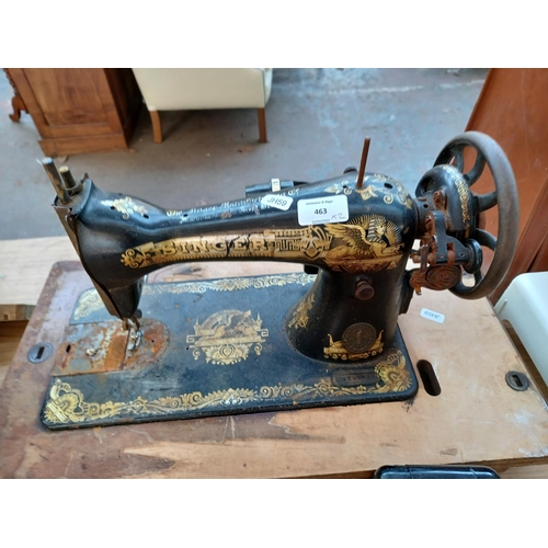 463 - Two Singer electric sewing machines with lights (serial numbers F7479834 and F4791722)