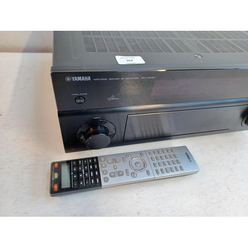 352 - A Yamaha RX-V2067 Natural Sound AV receiver with remote control.