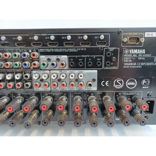 352 - A Yamaha RX-V2067 Natural Sound AV receiver with remote control.