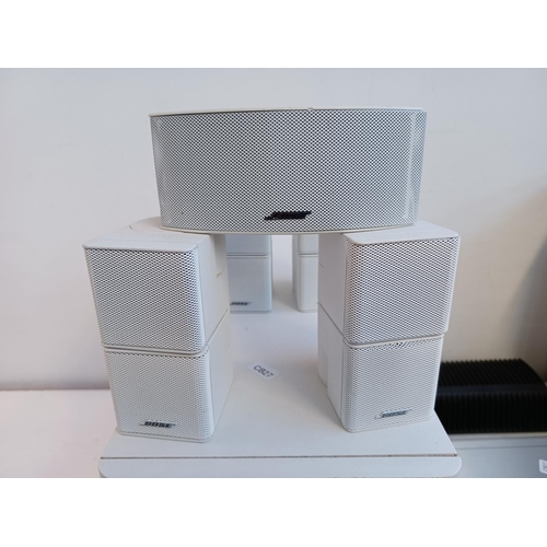 354 - A Bose Lifestyle 40 music system comprising powered Acoustimass 30 Series II speaker system, four cu... 