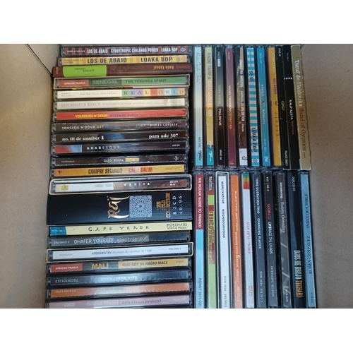 383 - Three boxes containing a collection of World Music CDs to include Gotam Project, Ozomatli, 1 Giant L... 