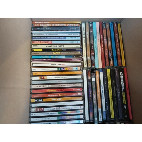 383 - Three boxes containing a collection of World Music CDs to include Gotam Project, Ozomatli, 1 Giant L... 