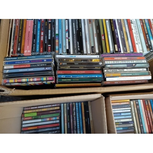 383 - Three boxes containing a collection of World Music CDs to include Gotam Project, Ozomatli, 1 Giant L... 