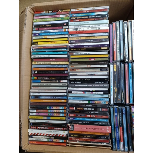 383 - Three boxes containing a collection of World Music CDs to include Gotam Project, Ozomatli, 1 Giant L... 