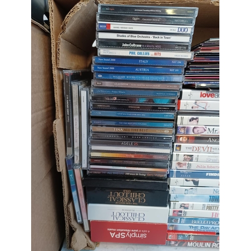 386 - Two boxes containing a collection of CDs and DVDs ; CDs to include Jimi Hendrix, Pink Floyd, The Bea... 