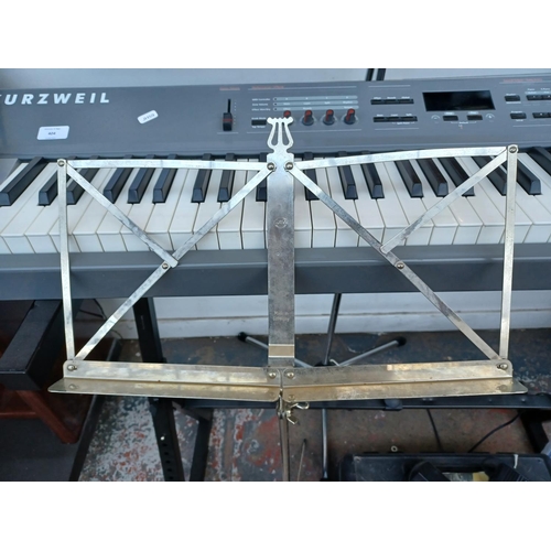 404 - A Kurzweil SP2X stage piano with stand, Shure P58 microphone and stand, foot pedal, power adaptor, m... 