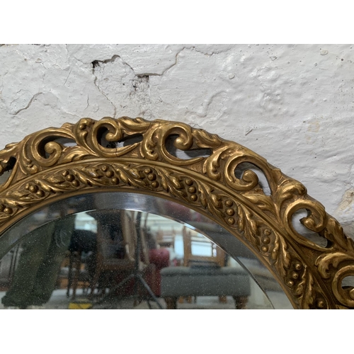 265 - A 19th century style gilt framed circular bevelled edge wall mirror - approx. 40cm diameter