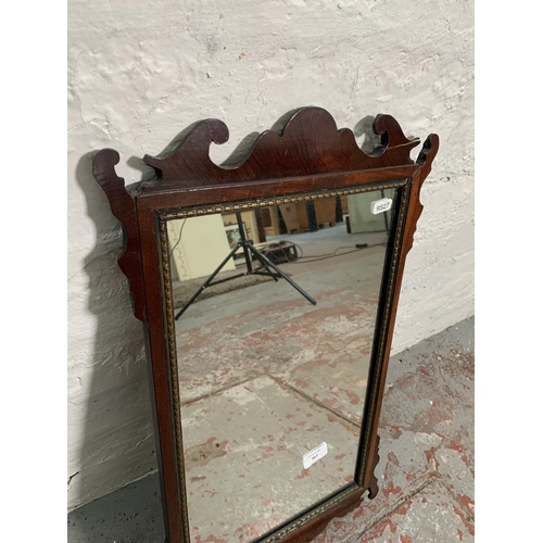 267 - A George II mahogany and parcel gilt framed wall mirror - approx. 60cm high x 35cm wide