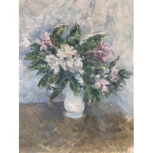 275 - A mid 20th century Stella Steyn (1907-1987) unframed oil on canvas of a floral still life scene bear... 