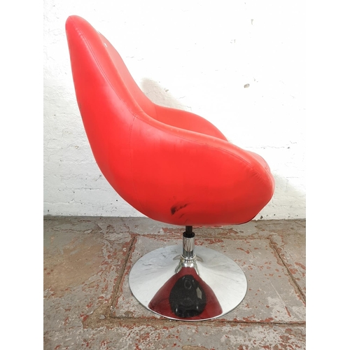 115 - A modern red leatherette and chrome effect swivel tub chair - approx. 98cm high x 72cm wide x 56cm d... 