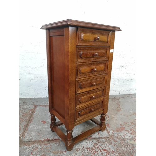 128 - An oak chest of six drawers - approx. 88cm high x 46cm wide x 36cm deep