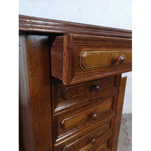 128 - An oak chest of six drawers - approx. 88cm high x 46cm wide x 36cm deep