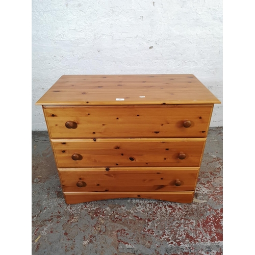 131 - A modern pine chest of three drawers - approx. 70cm high x 84cm wide x 43cm deep