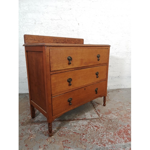 133 - A 1930s oak chest of three drawers - approx. 86cm high x 84cm wide x 44cm deep