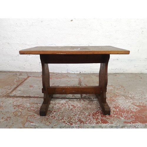 134 - A mid 20th century oak and tile top rectangular side table - approx. 49cm high x 39cm wide x 70cm lo... 