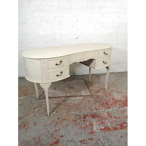 135 - A French style white painted kidney shaped dressing table - approx. 74cm high x 130cm wide x 51cm de... 