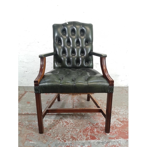 142 - A green leather and mahogany Gainsborough chair - approx. 101cm high x 60cm wide x 60cm deep