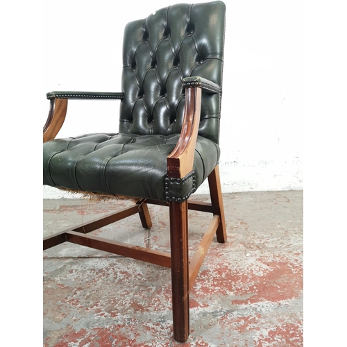 142 - A green leather and mahogany Gainsborough chair - approx. 101cm high x 60cm wide x 60cm deep