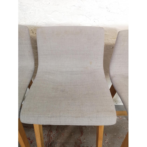 155 - Four grey upholstered and oak kitchen bar chairs