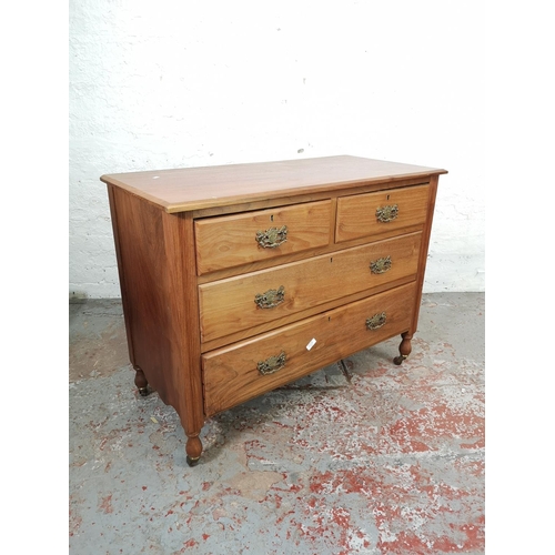 155A - An Edwardian satinwood chest of two short over two long drawers with castors - approx. 80cm high x 1... 