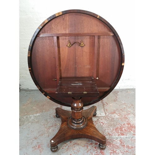 166 - A William IV rosewood circular tilt top pedestal breakfast table - approx. 74cm high x 120cm diamete... 