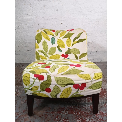 172 - An IKEA multicoloured floral upholstered easy chair, ref no. 701.031.70 - approx. 70cm high x 59cm w... 