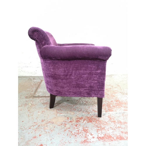 196 - A modern purple upholstered armchair - approx. 80cm high x 69cm wide x 62cm deep