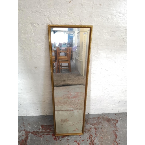 202 - Three various mirrors, two gilt framed and one 1930s style