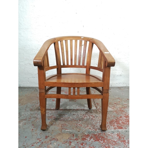 208 - An Indonesian solid teak Betawi chair - approx. 89cm high x 60cm wide x 47cm deep