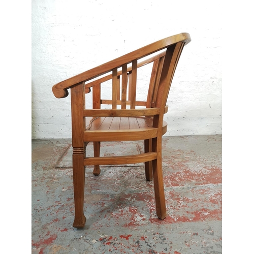 208 - An Indonesian solid teak Betawi chair - approx. 89cm high x 60cm wide x 47cm deep