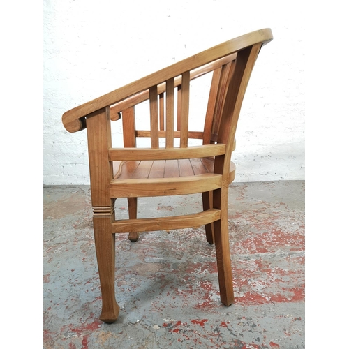 209 - An Indonesian solid teak Betawi chair - approx. 89cm high x 60cm wide x 47cm deep