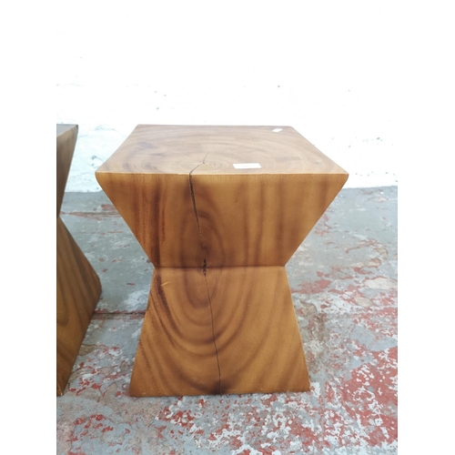 210 - A pair of Indonesian solid teak side tables - approx. 44cm high x 34cm square