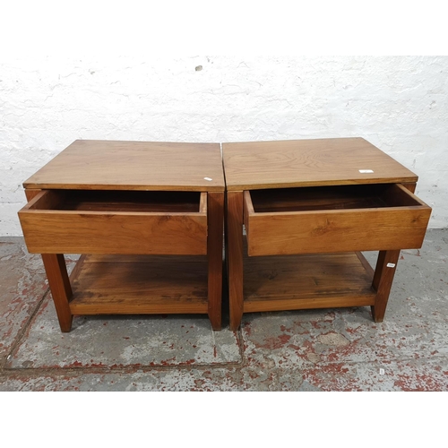 22 - A pair of Indonesian teak side tables each having single drawer - approx. 55cm high x 55cm wide x 44... 