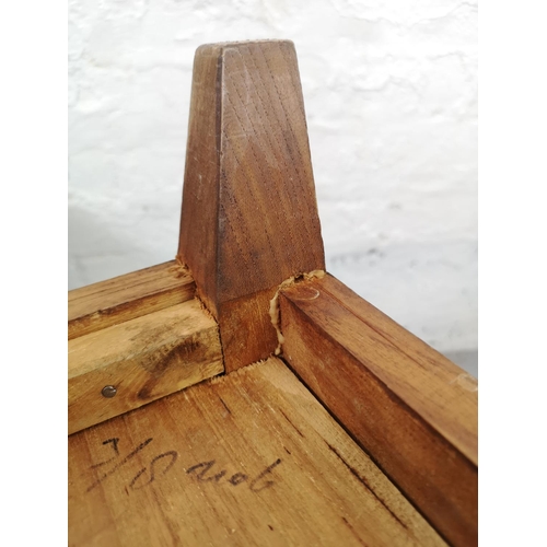 22 - A pair of Indonesian teak side tables each having single drawer - approx. 55cm high x 55cm wide x 44... 