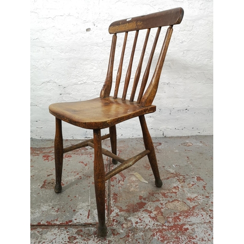 29 - Two Victorian elm and beech farmhouse dining chairs