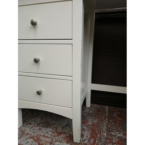 32 - A modern white laminate six drawer dressing table with matching two drawer bedside cabinet and dress... 