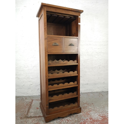 39 - An Indonesian teak tall wine cabinet with two upper drawers - approx. 169cm high x 65cm wide x 48cm ... 