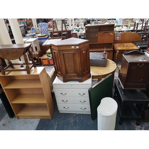 41 - A large collection of house clearance furniture to include chrome effect and beech kitchen bar stool... 