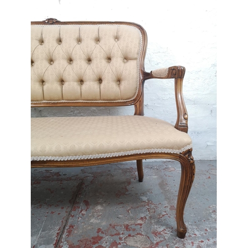 60 - A Victorian style beech and beige button back upholstered two seater parlour sofa - approx. 95cm hig... 