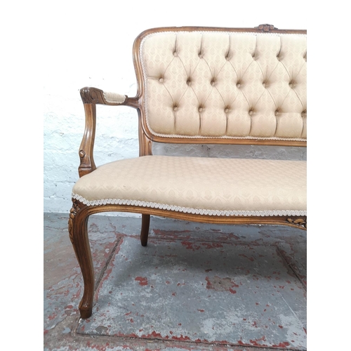 60 - A Victorian style beech and beige button back upholstered two seater parlour sofa - approx. 95cm hig... 