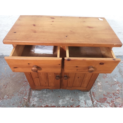 65 - A modern pine cabinet with two drawers and two lower doors - approx. 76cm high x 75cm wide x 39cm de... 